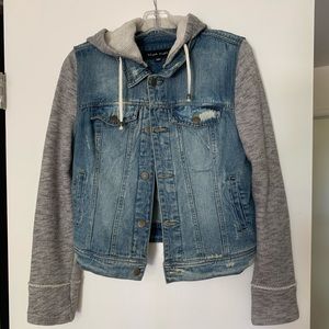 Denim jacket with grey sweatshirt details
